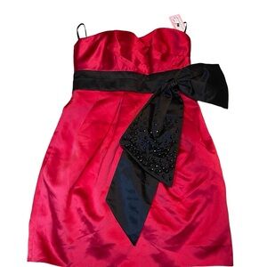 Phoebe Couture women size 8 Elegant Red/cranberry Satin Dress with Black Bow